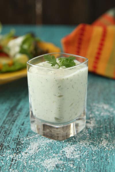 glass with green hatch chile dressing