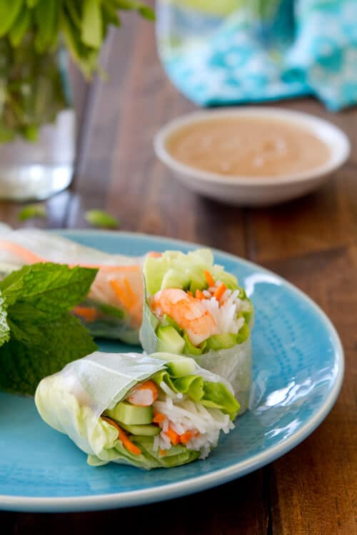 Gluten free Shrimp and Mint Summer Rolls with a zippy peanut sauce are the perfect party food! Set out the ingredients and let them roll! 