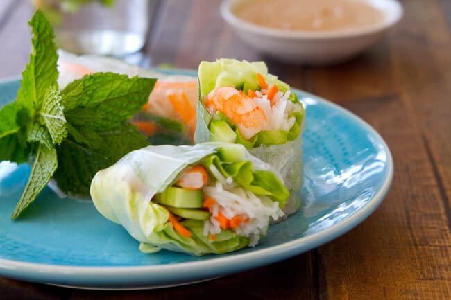 Gluten free Shrimp and Mint Summer Rolls with a zippy peanut sauce are the perfect party food! Set out the ingredients and let them roll! 