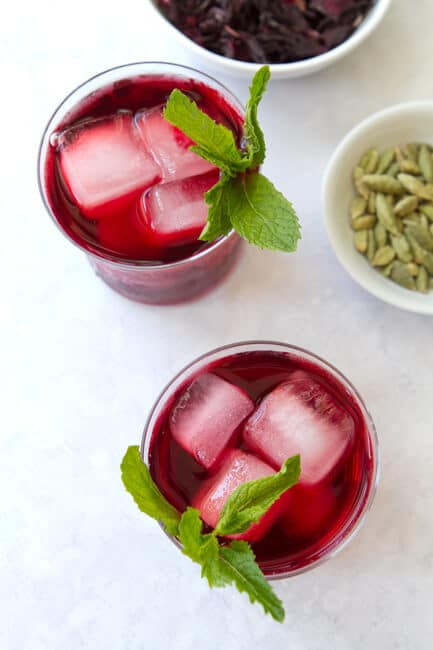 overhead shot of hibiscus and cardamon cooler