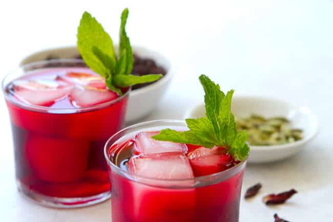 Two glasses of Hibiscus and Cardamon cooler