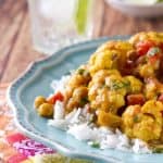 Curry powder and coconut milk flavor this easy Cauliflower and Chickpea curry recipe. A vegan 30 minute meal you'll want to make over and over again!!!