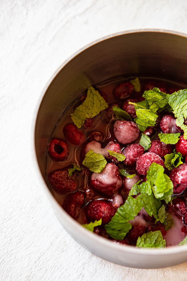 ingredients for raspberry mint simple syrup for a vodka spritzer