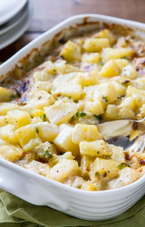 Rich, indulgent and easy, Potatoes Hashed in Cream casserole is a holiday must recipe! Make one day ahead and then straight into the oven!! 