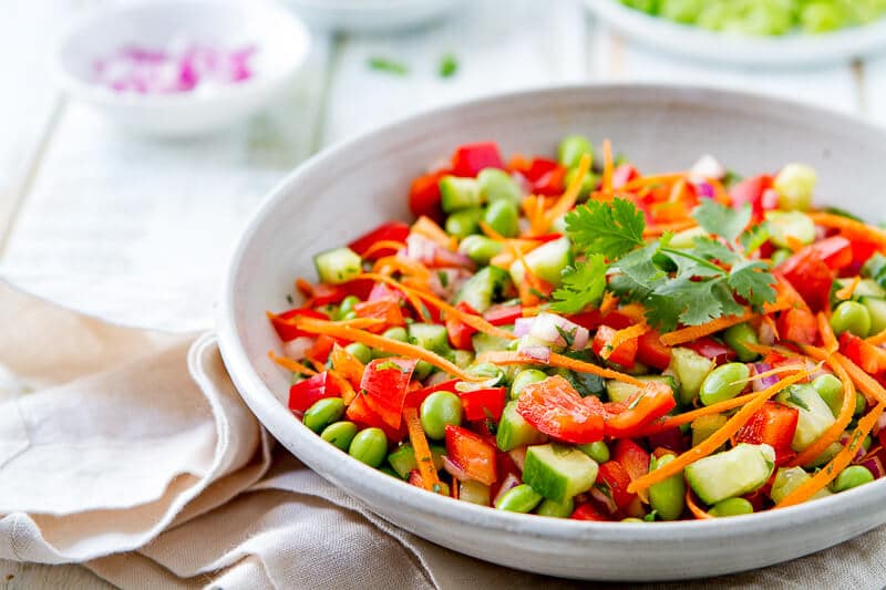 large bowl of my favorite asian salad recipe - edamame salad with ginger vinaigrette.