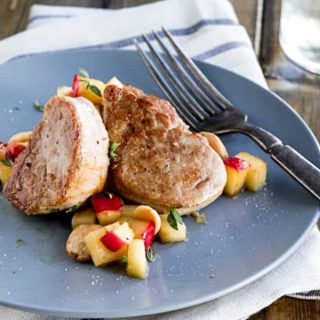 Simple and easy, this pork with apples and parsnips is flavored with a ginger and honey pan sauce. A one dish dinner that's ready in under 30 minutes.