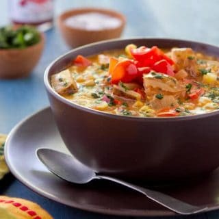 Got leftover salsa? Make soup!! This seriously simple chicken Salsa Chowder recipe is chock full of flavor and makes great use of refrigerator "odds and ends". 