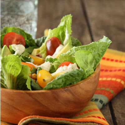 bowl of romaine salad with hatch green chile dressing