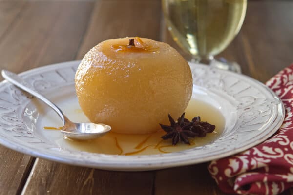 Korean poached pear in wine on a plate