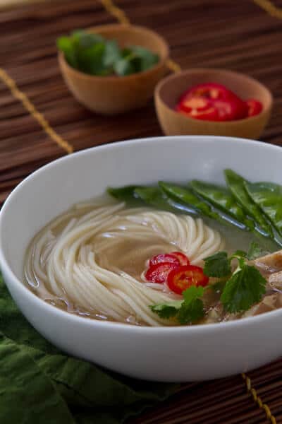 This easy Thai Hot and Sour Soup has all the flavors you love with a Thai twist! A flavorful broth, spiked with fresh chiles makes a fast weeknight meal!!!
