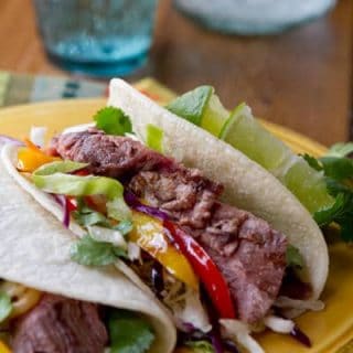 Michelada Marinated Steak Tacos - a great drink makes a great marinade for these easy, crowd pleasing steak tacos.