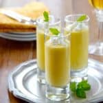 This easy Mango Coconut Mousse dessert recipe is dairy free! Made with fresh mango, it's tangy, creamy and an ideal make ahead summer dessert!