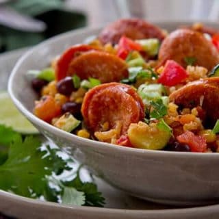 Black Bean,Rice and Sausage Salsa bowls are a one dish dinner! Ready in under 30 minutes and chock full of vegetables makes these bowls a weeknight wonder!