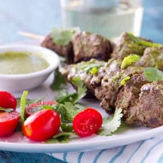 These grilled Mint, Coriander and Honey Kebabs are bathed in a sweet, tangy and herbaceous marinade that doubles as a dipping sauce.