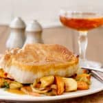 Baked Bourbon Maple Pork Chops with Sweet Potatoes and Apples are weeknight easy with a sweet and savory sauce will have you licking the spoon!