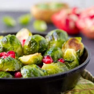 These sauteed brussels sprouts with pomegranate and balsamic vinegar make an easy, healthy side dish for pork, chicken or beef!