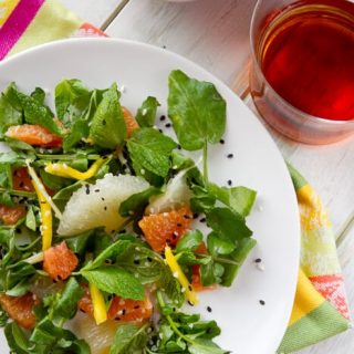 Sweet, sour and a little spicy, this Pomelo, Citrus and Mint Salad recipe is a refreshing side with grapefruit and mangos, perfect for backyard barbeques.