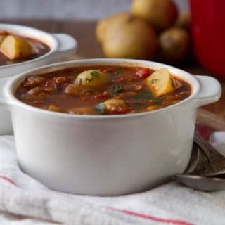 This spanish influenced Smoky Tomato Lentil Soup recipe is rich and satisfying.Sherry and paprika boost the flavor this pantry staple soup.