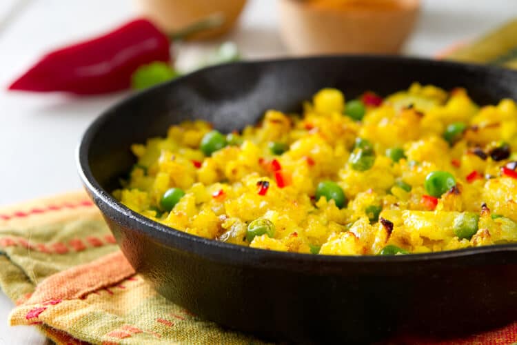 Fragrant with spices, this healthy, indian inspired Spiced Potato Hash recipe is a quick, colorful and nutritious vegetarian side dish.