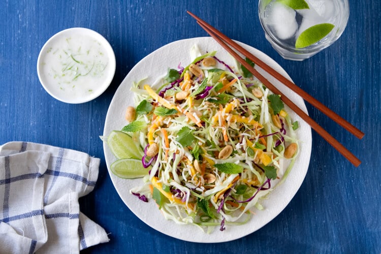 A Thai spin on classic coleslaw, this Thai coleslaw with Coconut and Lime is creamy, crunchy and a little spicy!