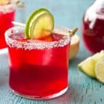 A riff on the tequila classic, Hibiscus Margaritas are easy to make for a crowd!