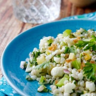 Cold Chopped Cauliflower Salad combines cauliflower, barley, mint and lemon in a healthy make ahead summer side perfect for bbqs and picnics.