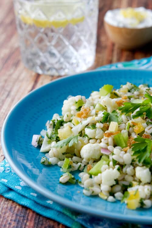Cold Chopped Cauliflower Salad combines cauliflower, barley, mint and lemon in a healthy make ahead summer side perfect for bbqs and picnics.