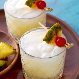 The traditional Pina Colada with a Twist. This recipe uses fresh lime juice to balance the sweetness of this classic cocktail - no blender required!