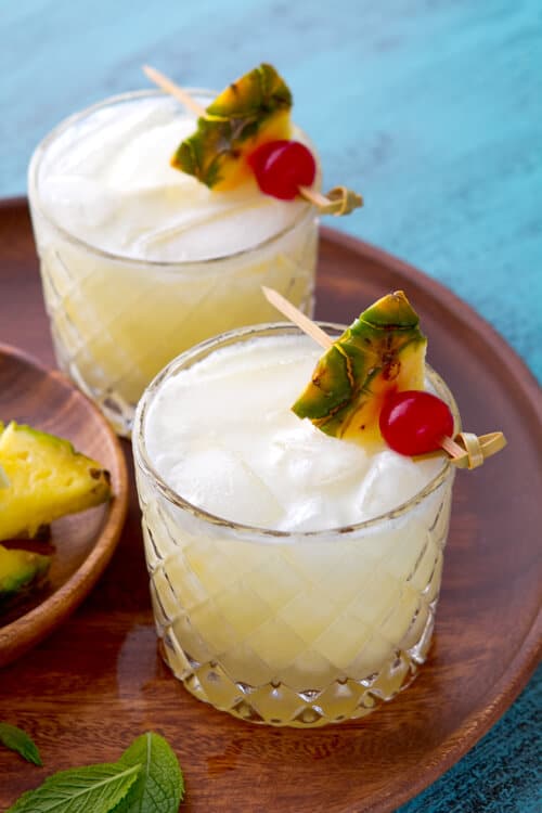 The traditional Pina Colada with a Twist. This recipe uses fresh lime juice to balance the sweetness of this classic cocktail - no blender required!