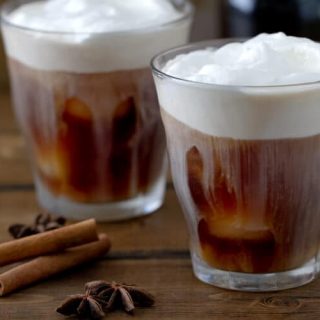 A spiced simple syrup makes this homemade Spiced Iced Coffee recipe an easy and indulgent but not too sweet iced coffee.