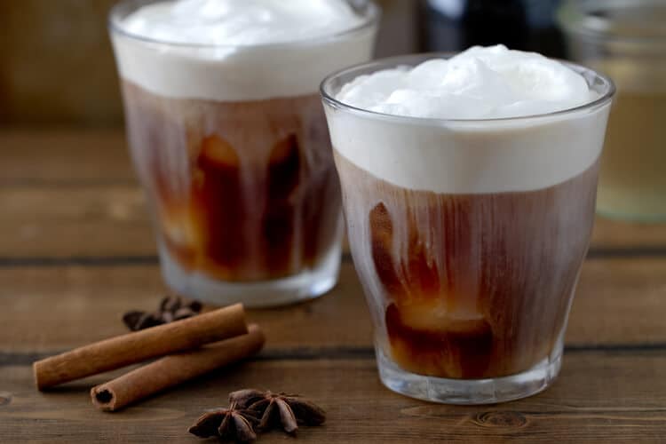 A spiced simple syrup makes this homemade Spiced Iced Coffee recipe an easy and indulgent but not too sweet iced coffee. 
