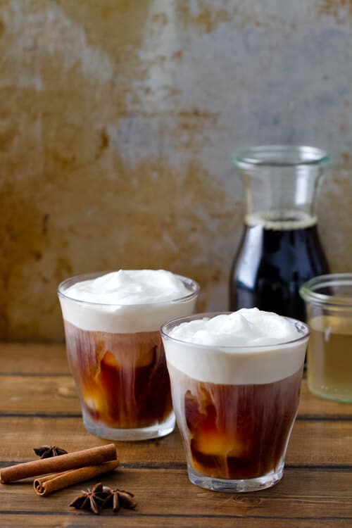 A spiced simple syrup makes this homemade Spiced Iced Coffee recipe an easy and indulgent but not too sweet iced coffee. 