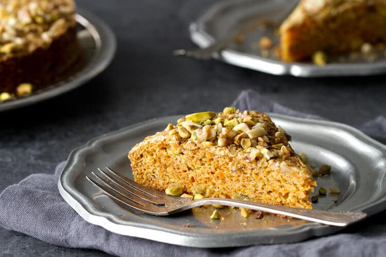 This Easy and Healthy Carrot Cake recipe is so moist, no frosting needed. Cardamon and pistachios give an Indian twist to this luscious cake.