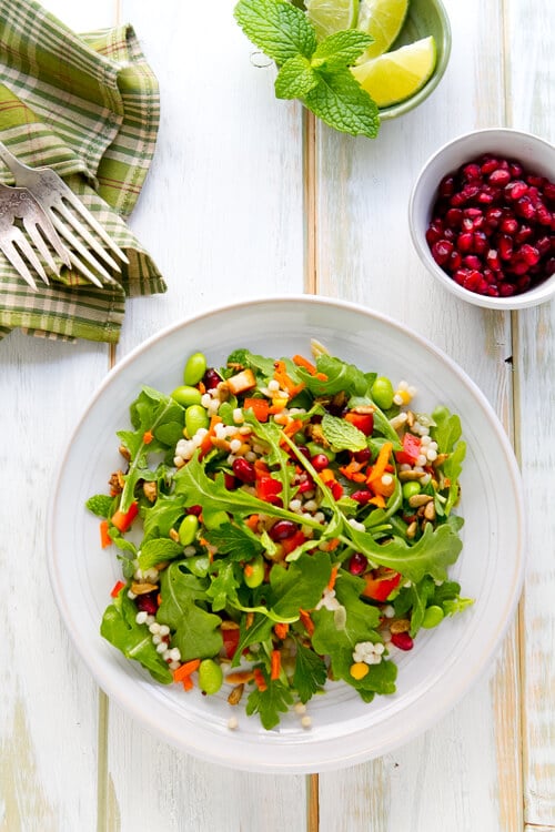 This vegetarian Vegetable Salad with Honey Lime Dressing recipe is sweet, sassy and full of legumes, greens, vegetables and grains. 