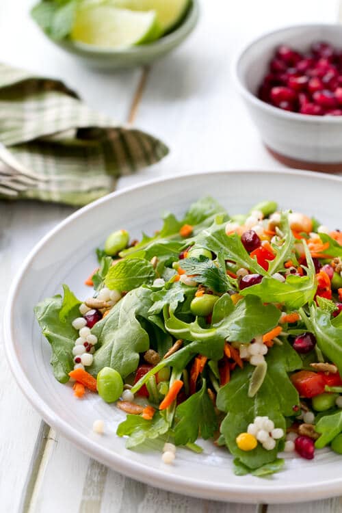 This vegetarian Vegetable Salad with Honey Lime Dressing recipe is sweet, sassy and full of legumes, greens, vegetables and grains. 