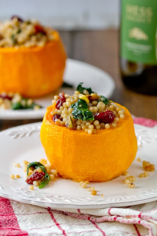 Vegetarian couscous stuffed butternut squash bowl recipe.