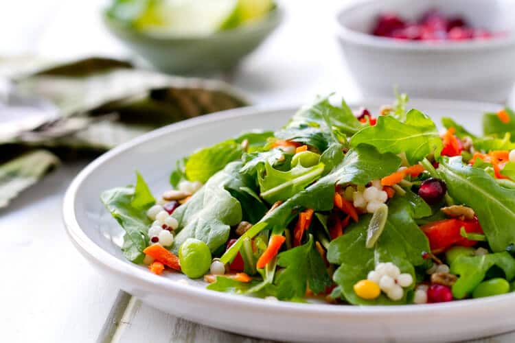 This vegetarian Vegetable Salad with Honey Lime Dressing recipe is sweet, sassy and full of legumes, greens, vegetables and grains. 