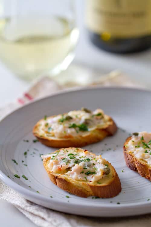 scampi style shrimp toast on a plate.