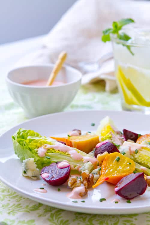 Wedge Salad with Creamy Beet Dressing is a fresh take on the classic using Little gem lettuce, roasted beets, blue cheese and walnuts. 