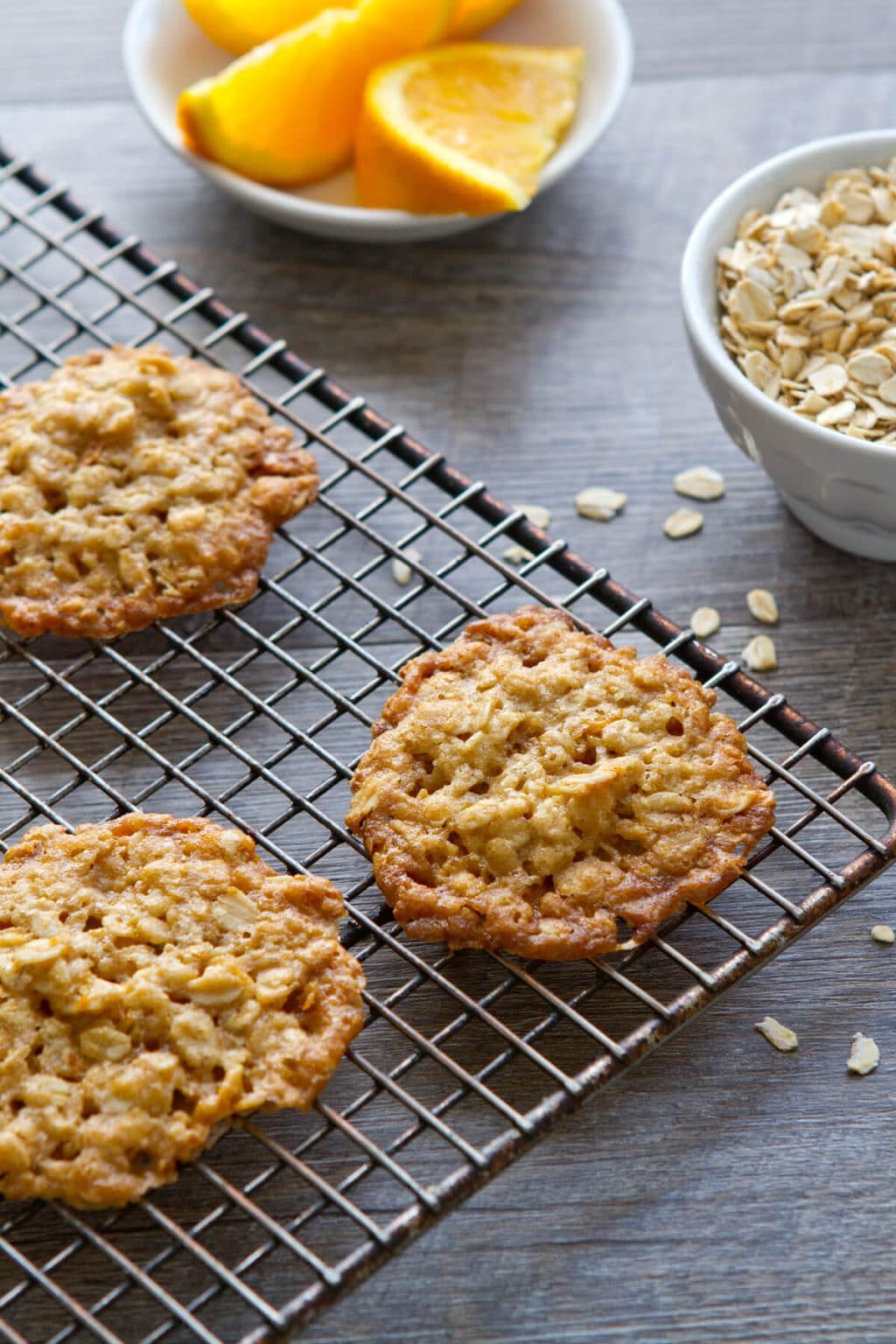 A little crispy, a little chewy, these one bowl Orange Ginger Oatmeal Crisps cookies are a healthy treat and are perfect with ice cream.