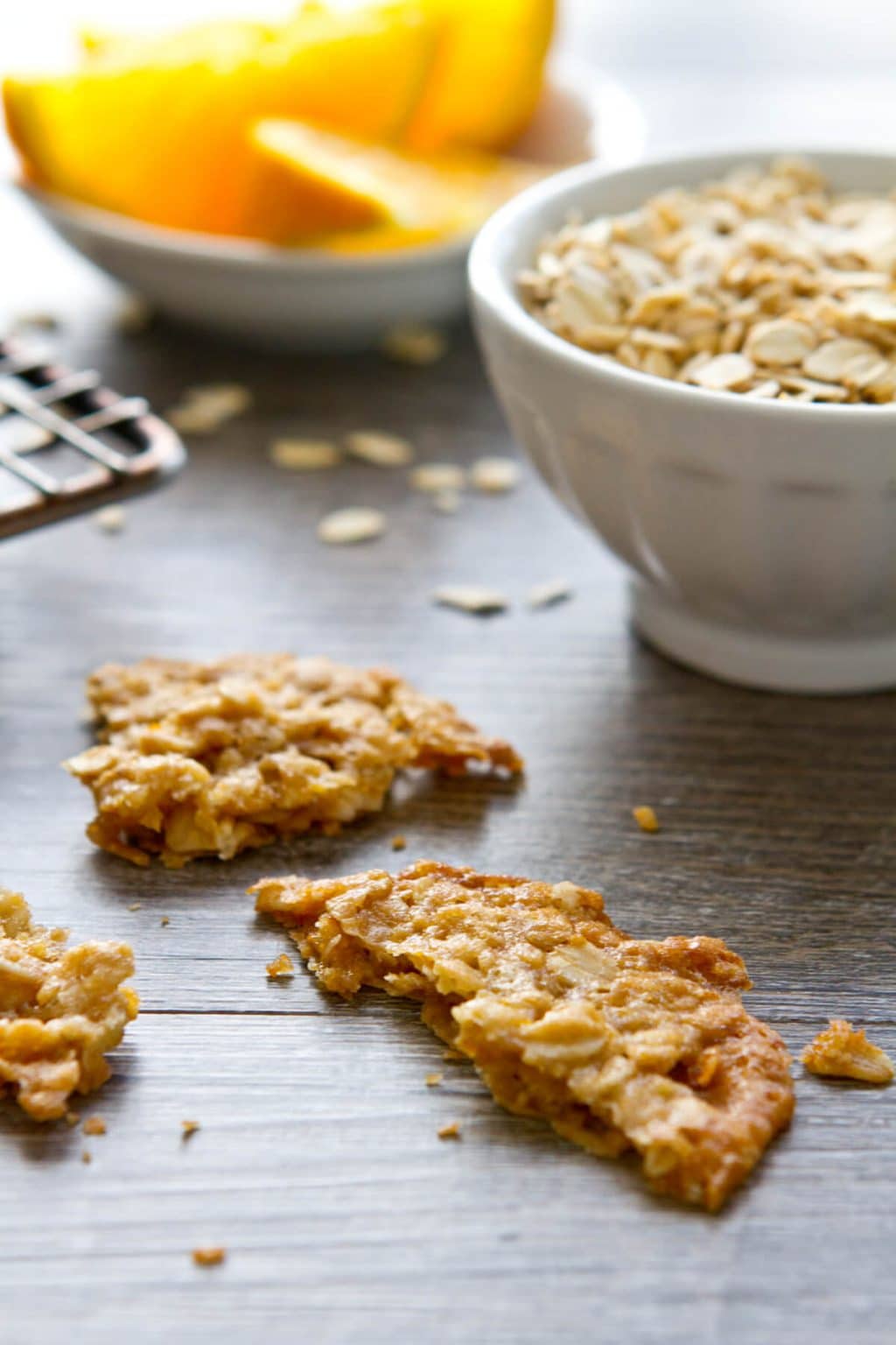 A little crispy, a little chewy, these one bowl Orange Ginger Oatmeal Crisps cookies are a healthy treat and are perfect with ice cream.