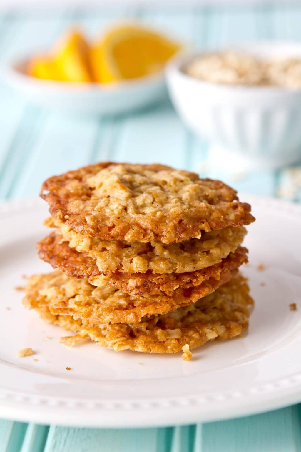 A little crispy, a little chewy, these one bowl Orange and Ginger Oatmeal Crisps cookies are a healthy treat and are perfect with ice cream.