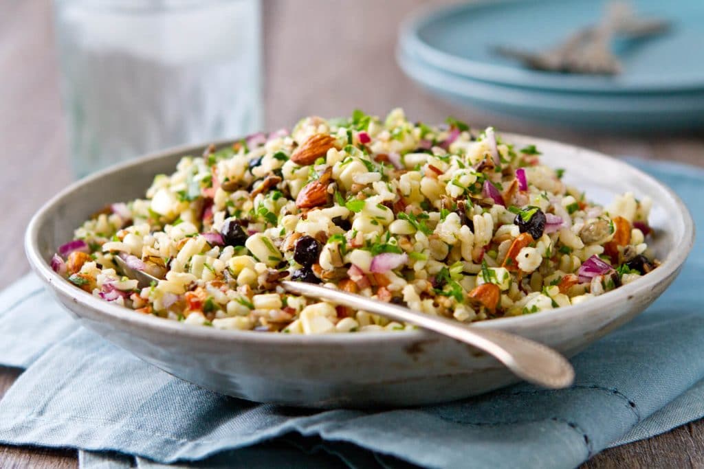 This healthy Corn and Blueberry Wild Rice Salad recipe is sweet, salty and crunchy and one you can't stop eating!