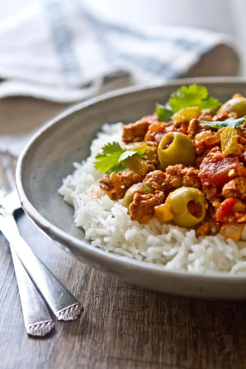 Sweet, salty and spicy, Cuban Style Turkey Picadillo boasts long simmered flavor but it's ready in 30 minutes due to this secret ingredient. 