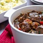 Chasseur Style Beef Stew is an easy and satisfying one pot french style beef stew with mushrooms, tomatoes, shallots and white wine that's ideal for winter.