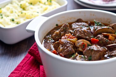 Chasseur Style Beef Stew is an easy and satisfying one pot french style beef stew with mushrooms, tomatoes, shallots and white wine that's ideal for winter.