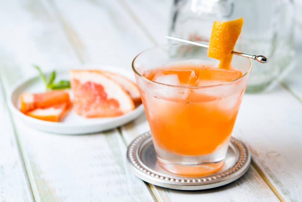 The Part Time Lover - an easy aperol tequila cocktail recipe that's sweet and sour! A refreshing and simple summer drink for backyard parties!