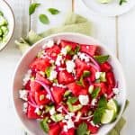 This Watermelon, Mint and Cucumber Salad recipe is my summer "go to". Lime juice, briny feta and olive oil round out the flavors in this easy side dish.