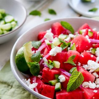 This Watermelon, Mint and Cucumber Salad recipe is my summer "go to". Lime juice, briny feta and olive oil round out the flavors in this easy side dish.