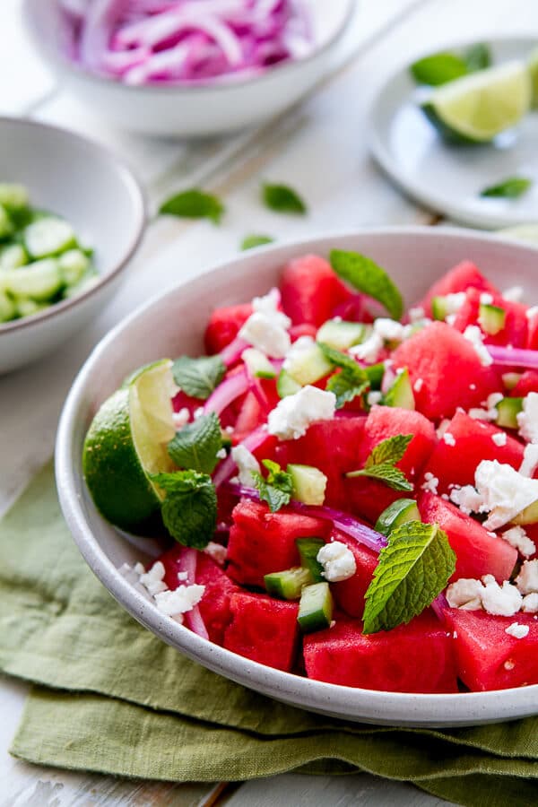 This Watermelon, Mint and Cucumber Salad recipe is my summer "go to". Lime juice, briny feta and olive oil round out the flavors in this easy side dish. 